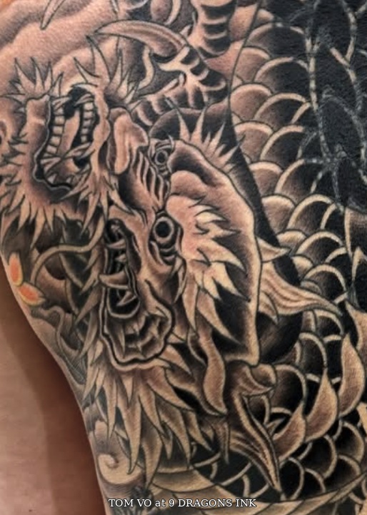 Dragon head tattoo close-up by Tom Vo at 9 Dragons Ink in San Jose