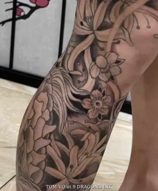 Floral tattoo detail by Tom Vo at 9 Dragons Ink in San Jose