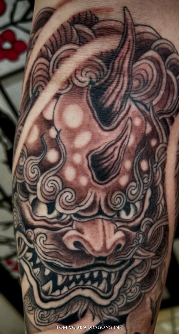 Foo dog tattoo detail by Tom Vo at 9 Dragons Ink in San Jose