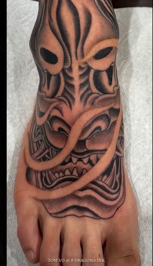 Hannya mask tattoo by Tom Vo at 9 Dragons Ink in San Jose