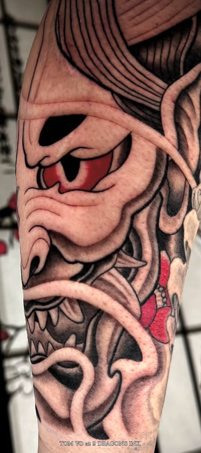 Japanese warrior mask tattoo detail by Tom Vo at 9 Dragons Ink in San Jose