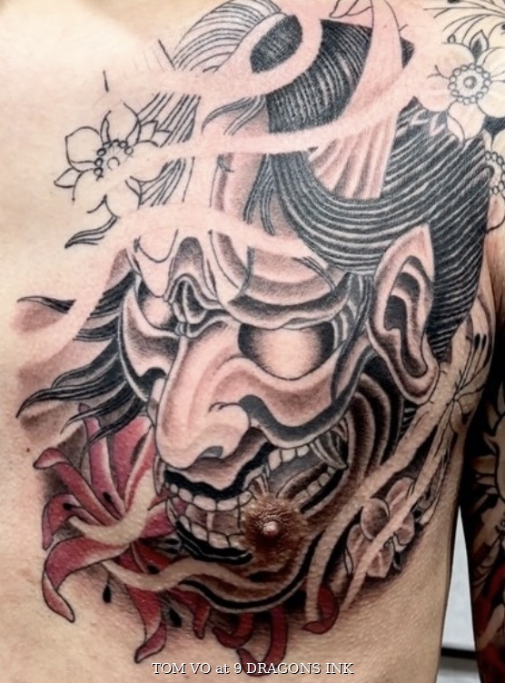 Tengu mask tattoo by Tom Vo in San Jose