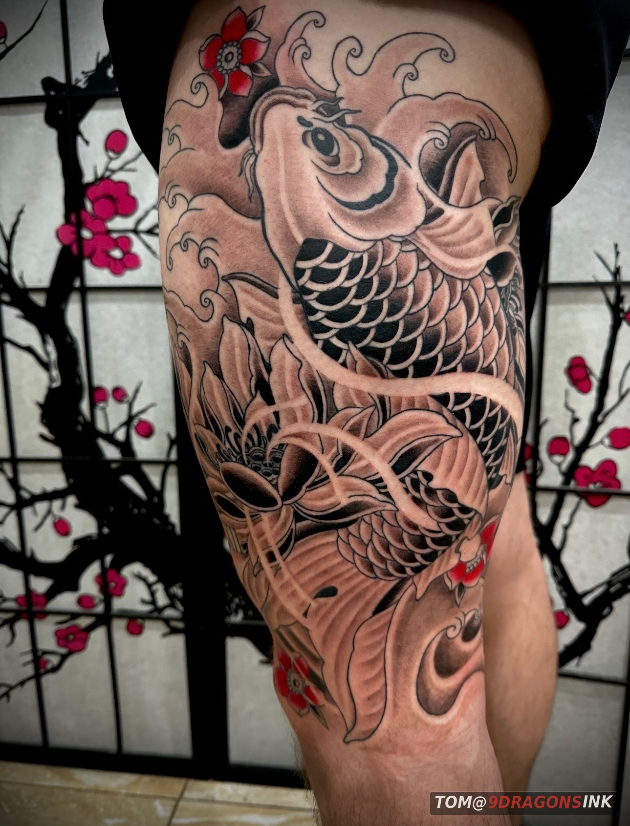 Large koi and lotus tattoo by Tom at 9 Dragons Ink in San Jose
