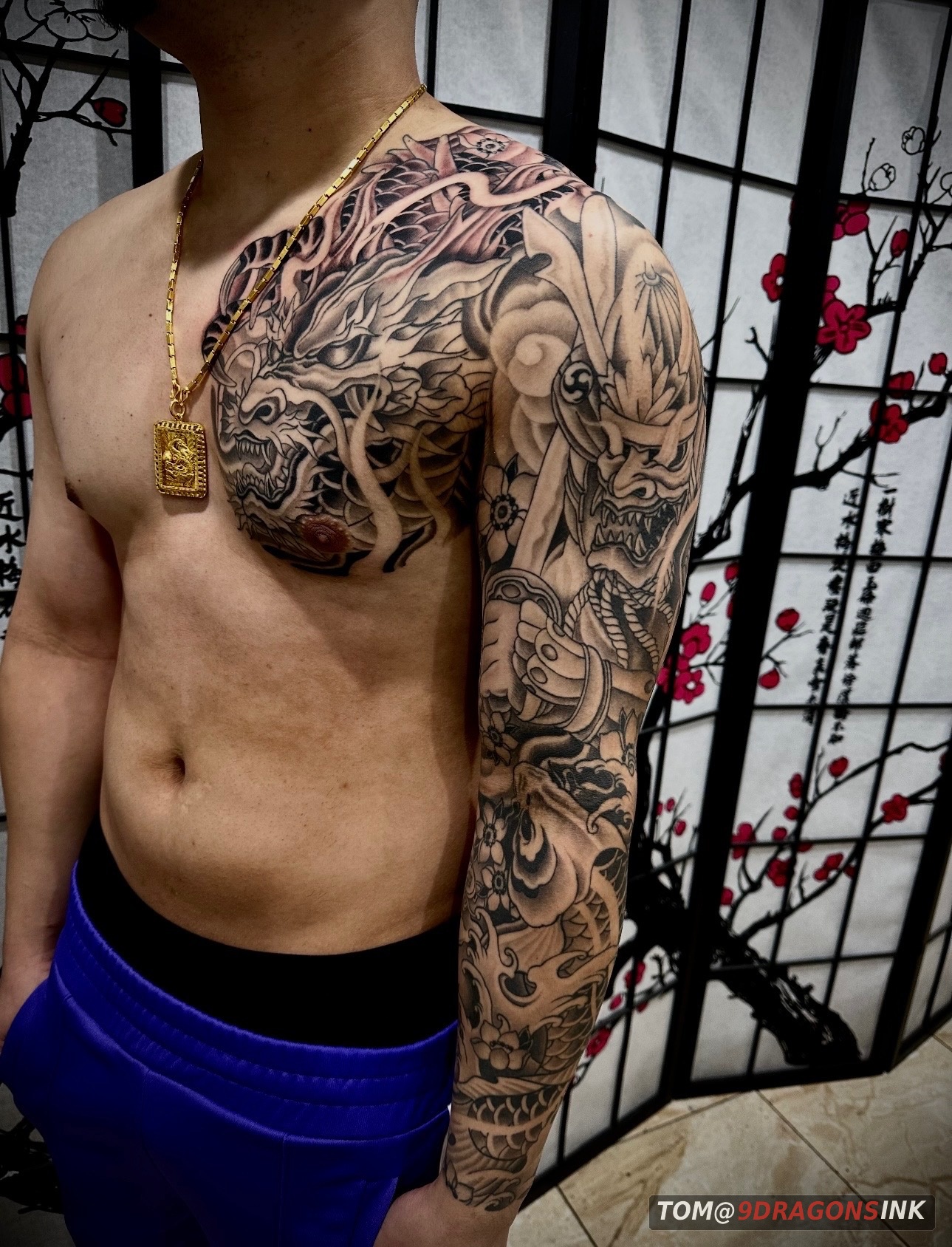 Dragon and warrior full sleeve tattoo by Tom at 9 Dragons Ink