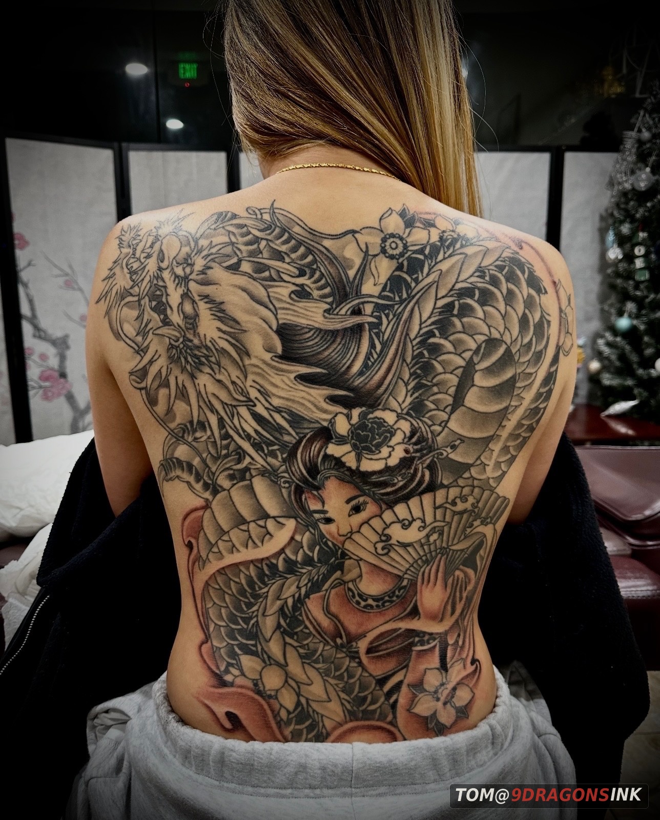 Dragon chest and sleeve tattoo by Tom at 9 Dragons Ink