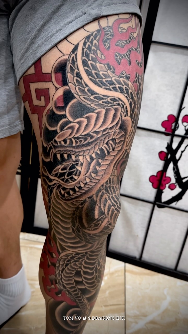 Snake leg sleeve by Tom at 9 Dragons Ink in San Jose